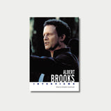A book cover titled "Albert Brooks: Interviews" featuring a portrait of filmmaker and actor Albert Brooks looking to the side.