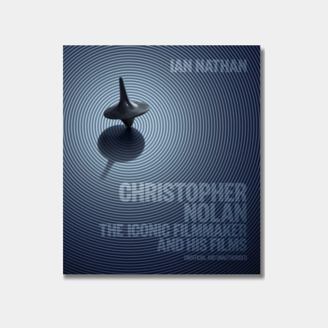 Book cover for "Christopher Nolan: The Iconic Filmmaker and His Work" featuring a spinning top from the movie Inception centered against a background of concentric blue circles.