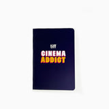 Notebook with 'tiff Cinema Addict' text on a white background
