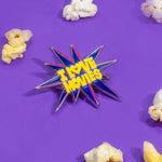 Pin with 'I Love Movies' text surrounded by popcorn on a purple background