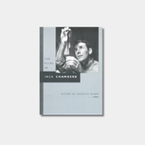 The book cover for "The Films of Jack Chambers" features a gray background with a black-and-white photograph of a man examining a strip of film.