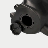 The bottom of a black Jiji figurine is shown with its circular plastic coin plug removed next to the open slot.