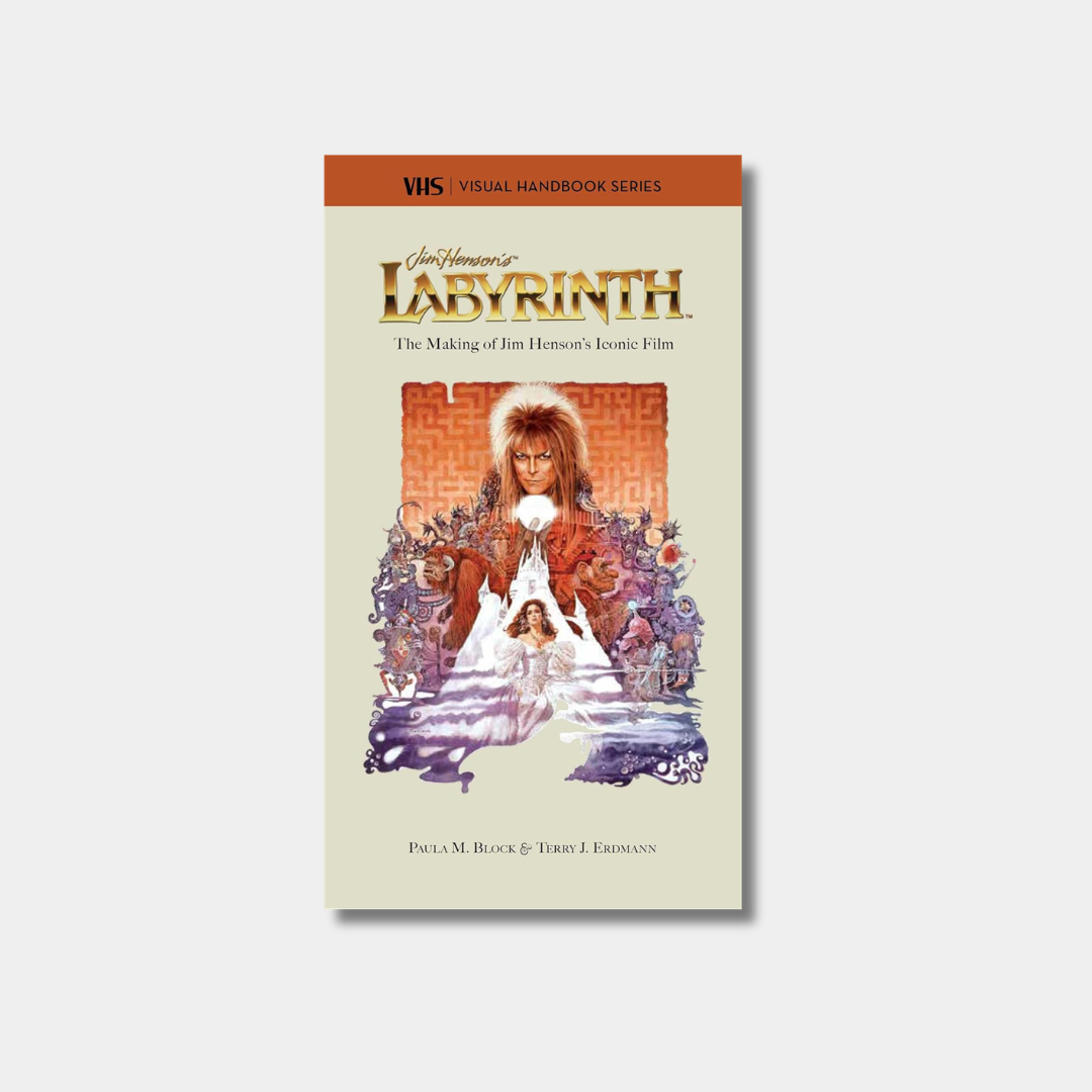 The book cover for "Labyrinth: The Making of Jim Henson's Iconic Film" by Paula M. Block and Terry J. Erdmann features the movie's classic poster art showing Jareth the Goblin King and Sarah.