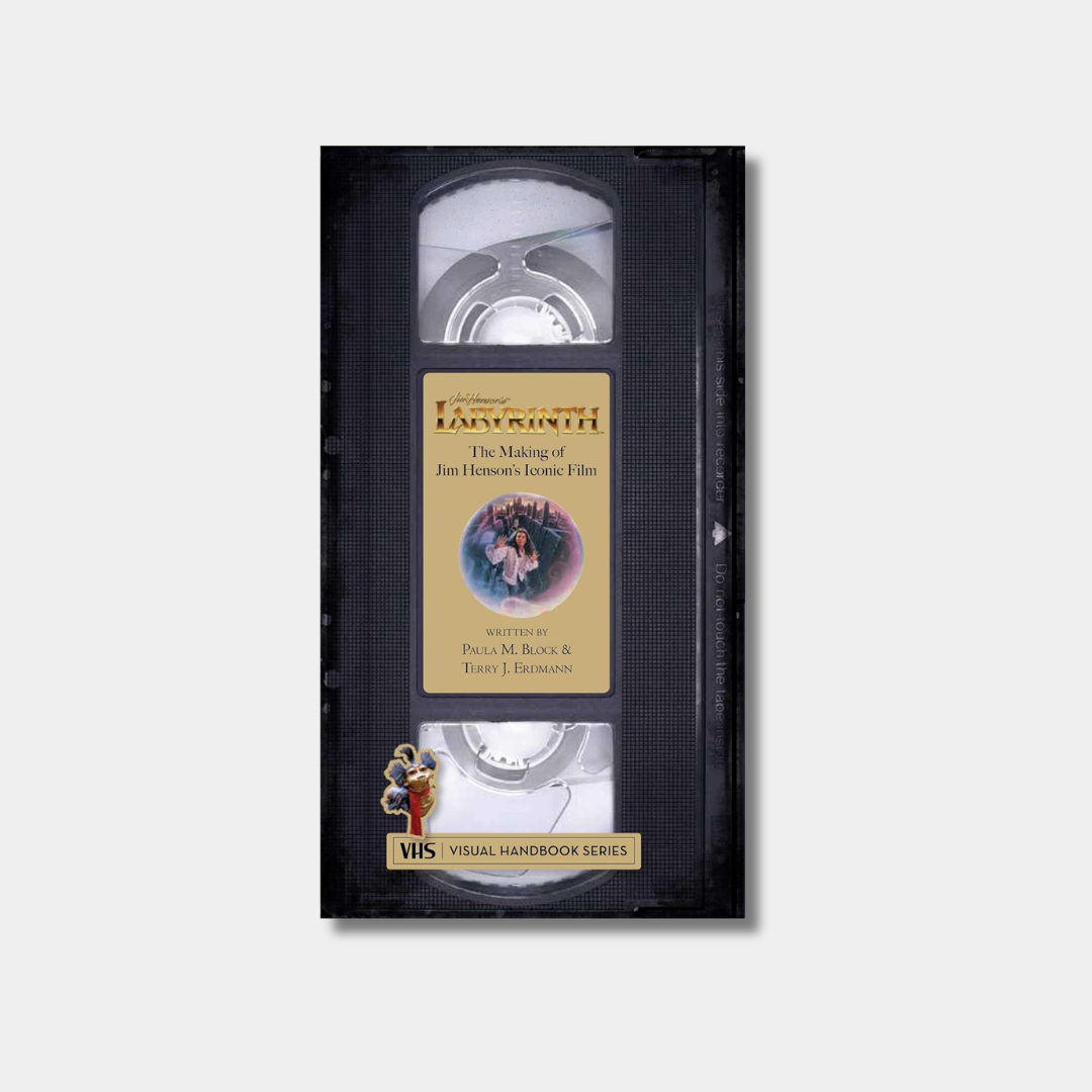 The "Labyrinth: The Making of Jim Henson's Iconic Film" book is designed to look like a classic black VHS tape, complete with a center label featuring the movie's title and authors.