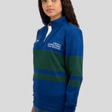 A model wears a blue and dark green quarter-zip pullover featuring "EST. 1976" and "TORONTO INTERNATIONAL FILM FESTIVAL" printed on the chest.