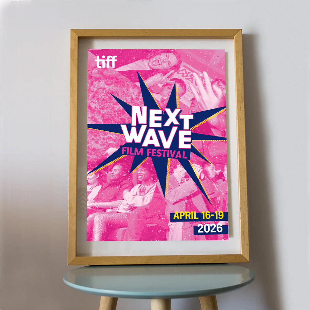 Framed poster for TIFF Next Wave Film Festival on a table against a white wall