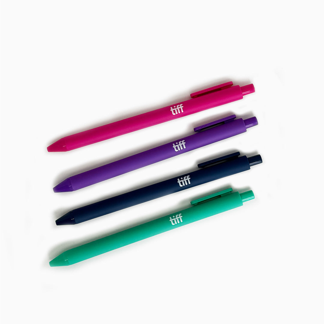 A set of four pens in pink, purple, navy, and teal.