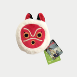 A round, plush pouch designed to look like Princess Mononoke's iconic red mask, bordered with fluffy white faux fur and red-and-black ears, shown alongside an official Studio Ghibli character tag.