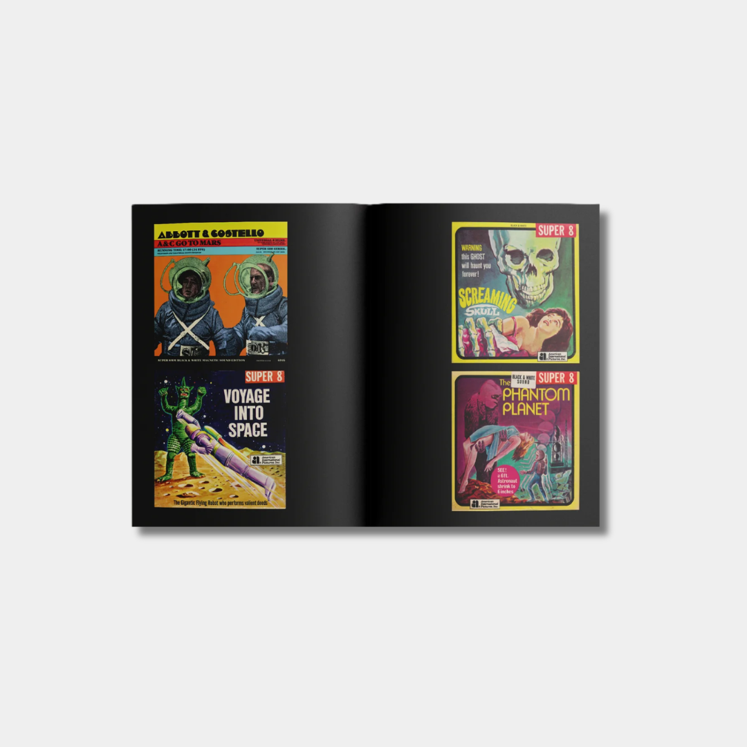 An open book spread displaying four colorful vintage movie poster box covers for "Abbott & Costello Go to Mars," "Voyage into Space," "The Screaming Skull", and "The Phantom Planet" against a solid black background.