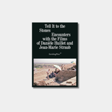 Book cover for "Tell It to the Stones: Encounters with the Films of Danièle Huillet and Jean-Marie Straub," featuring a black background with white text title and photograph of people under umbrellas at an archaeological site.