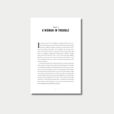 An open book spread displaying two pages of text from Chapter 1, titled "A Woman in Trouble," featuring a large drop cap at the beginning of the chapter on the left page.