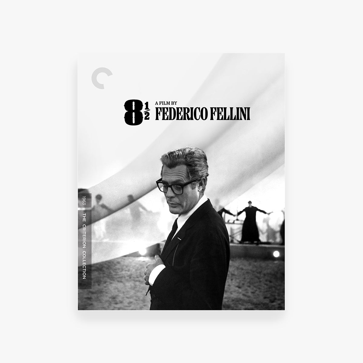 DVD cover of '8 1/2' by Federico Fellini with a black and white photo of a man in glasses and suit.
