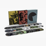 Collection of vinyl records with colorful covers on a white background