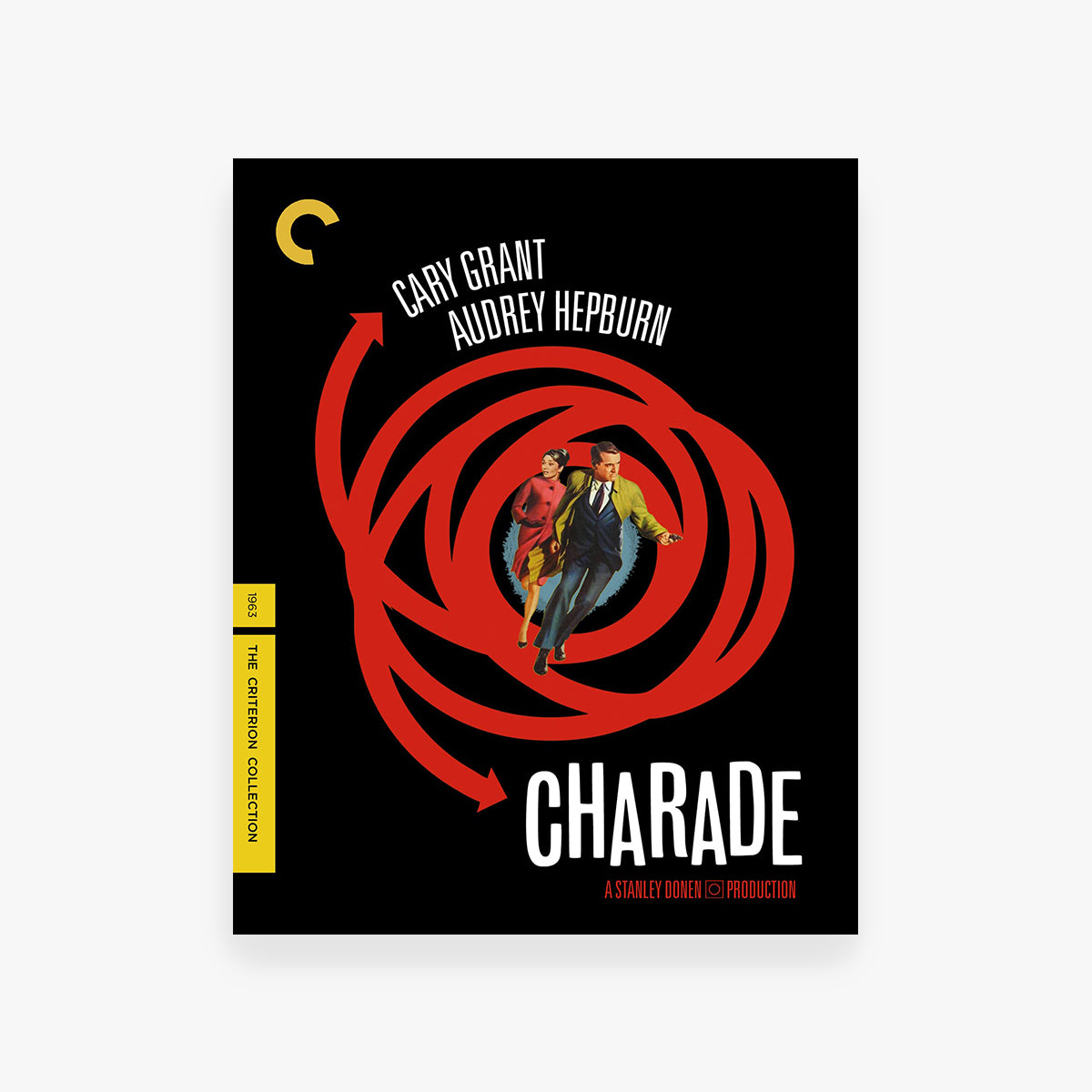 DVD cover for 'Charade' featuring Cary Grant and Audrey Hepburn with a red spiral design.