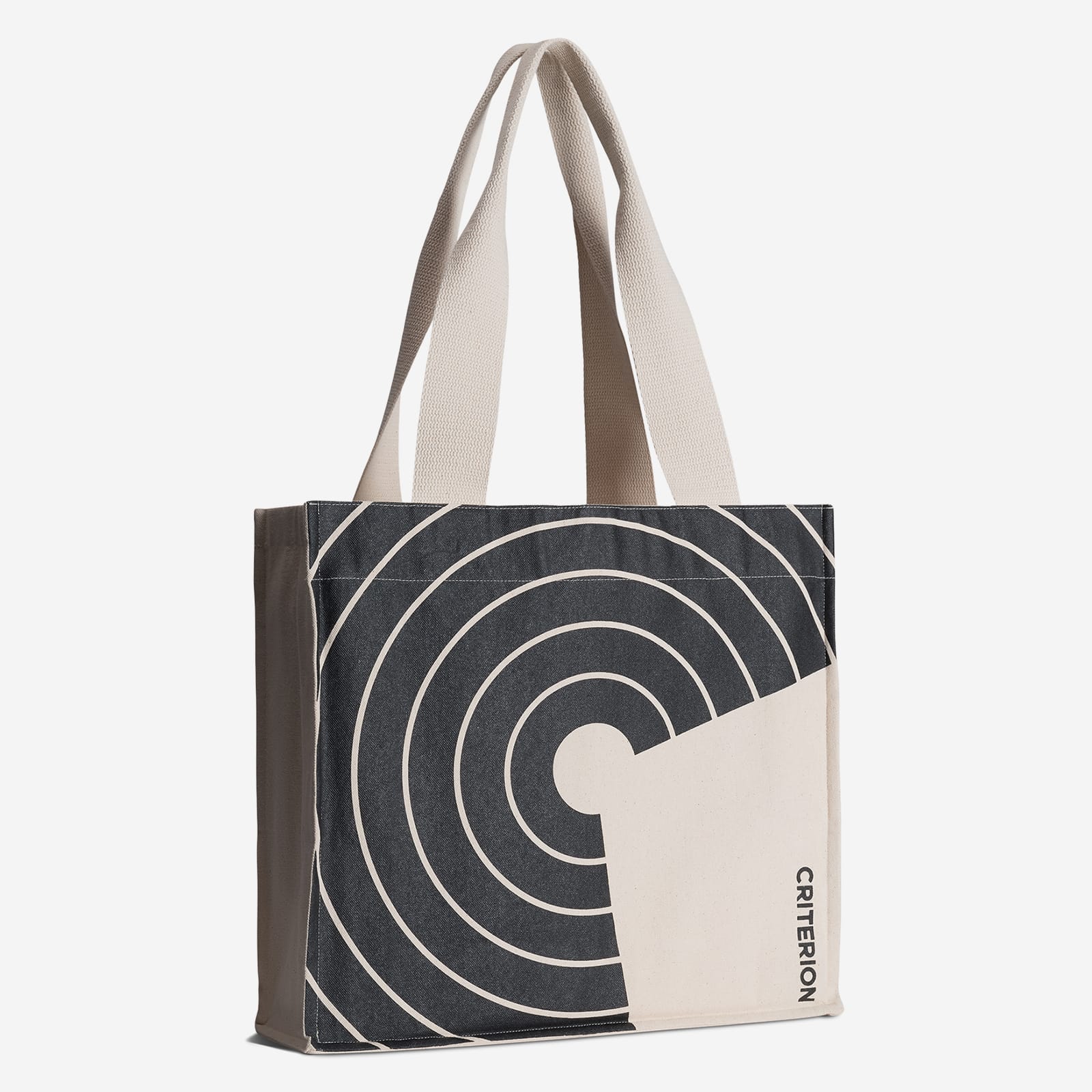Tote bag with geometric design and 'Criterion' branding on a white background