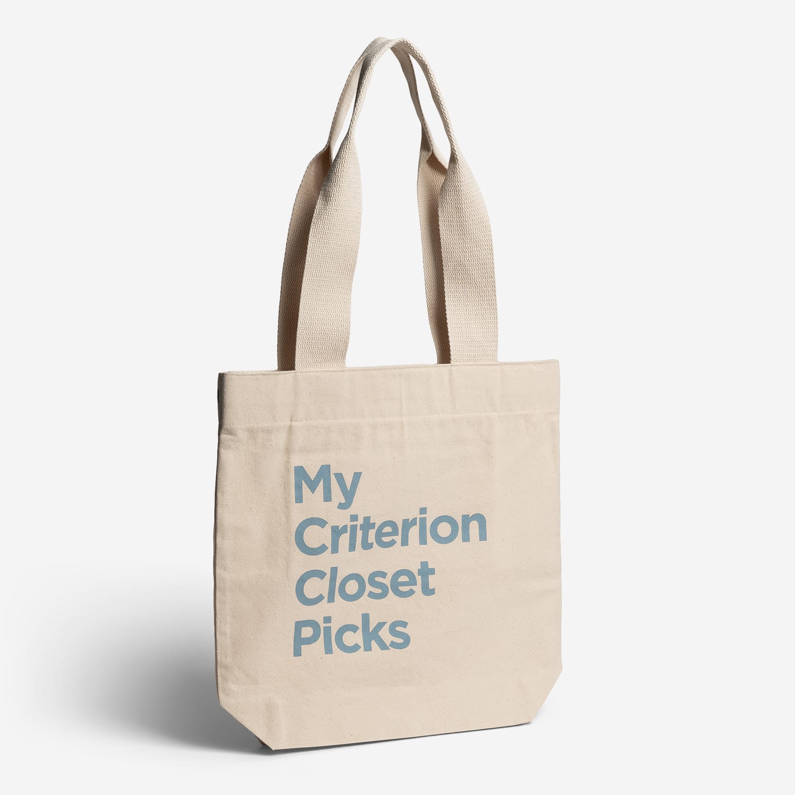 Beige tote bag with 'My Criterion Closet Picks' text in blue on a white background