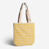 Tote bag with yellow text on a white background
