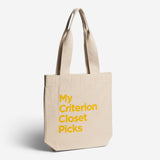 Beige tote bag with yellow text 'My Criterion Closet Picks' on a white background