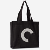 Black tote bag with a white logo on a white background