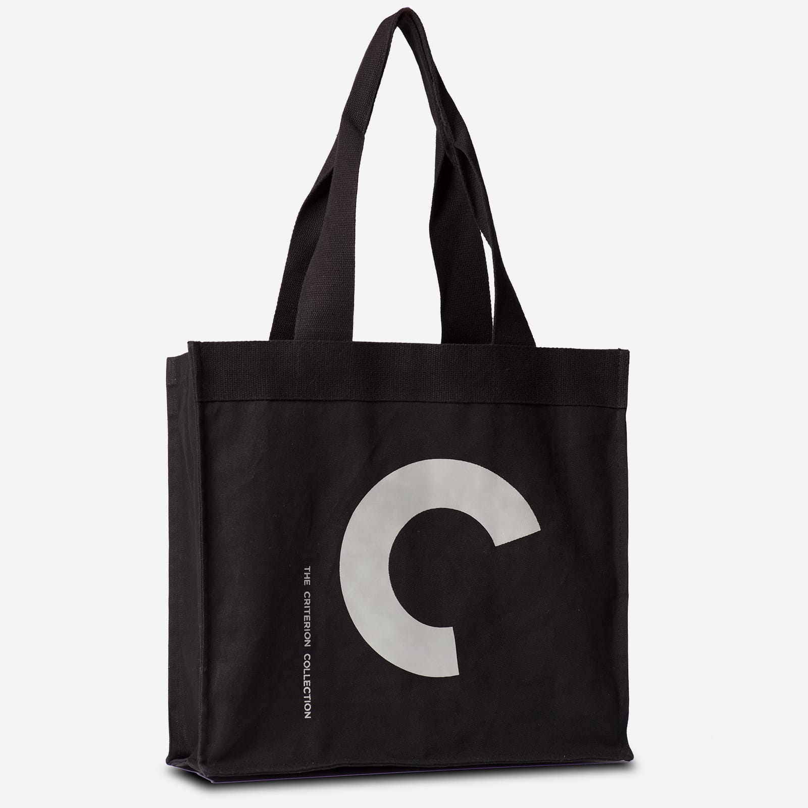 Black tote bag with a white logo on a white background