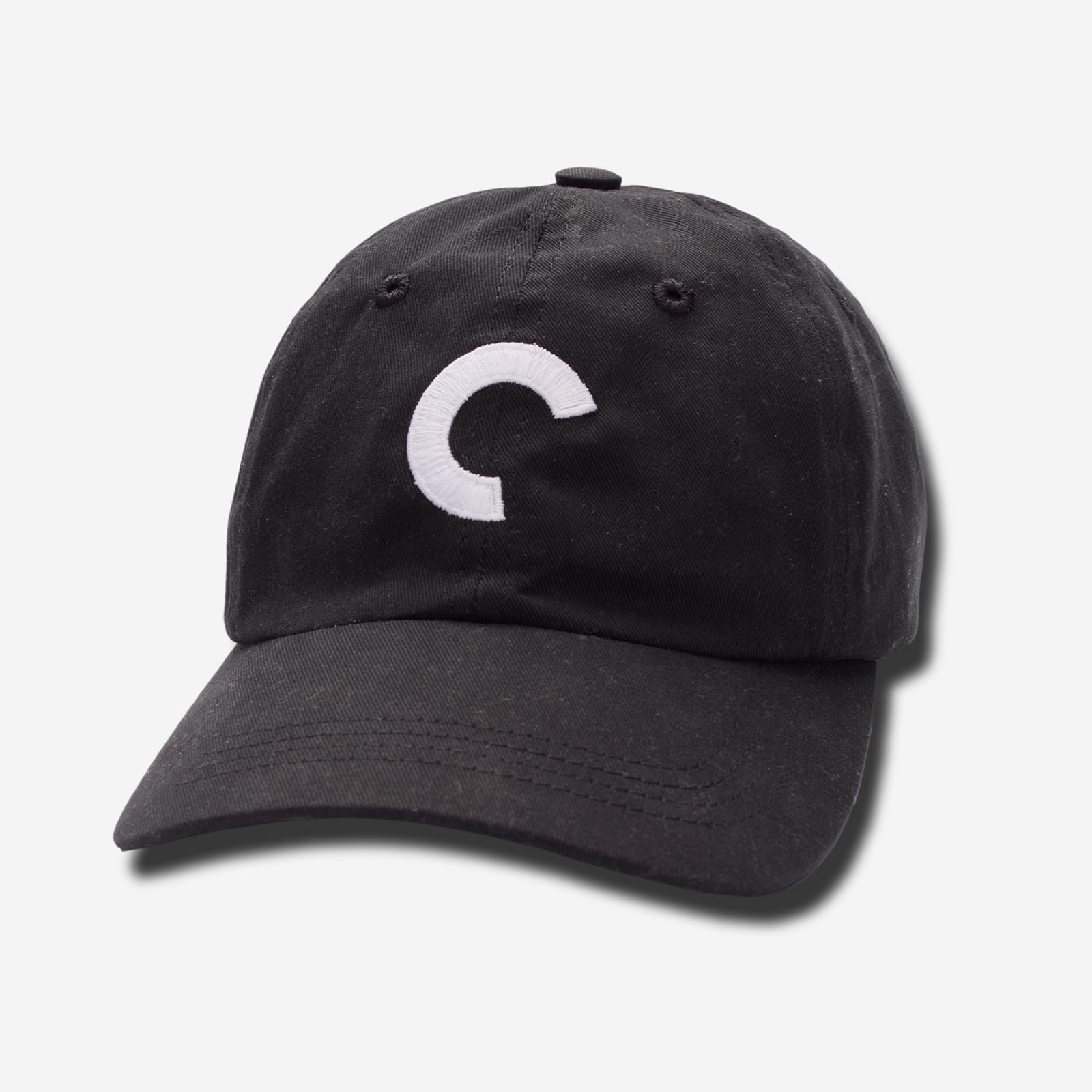 Black cap with a white logo on a light gray background
