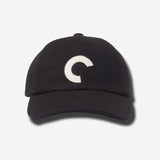Black cap with a white logo on a light gray background