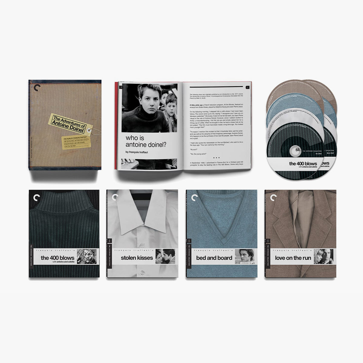 Collection of movie posters and DVD cases on a white background