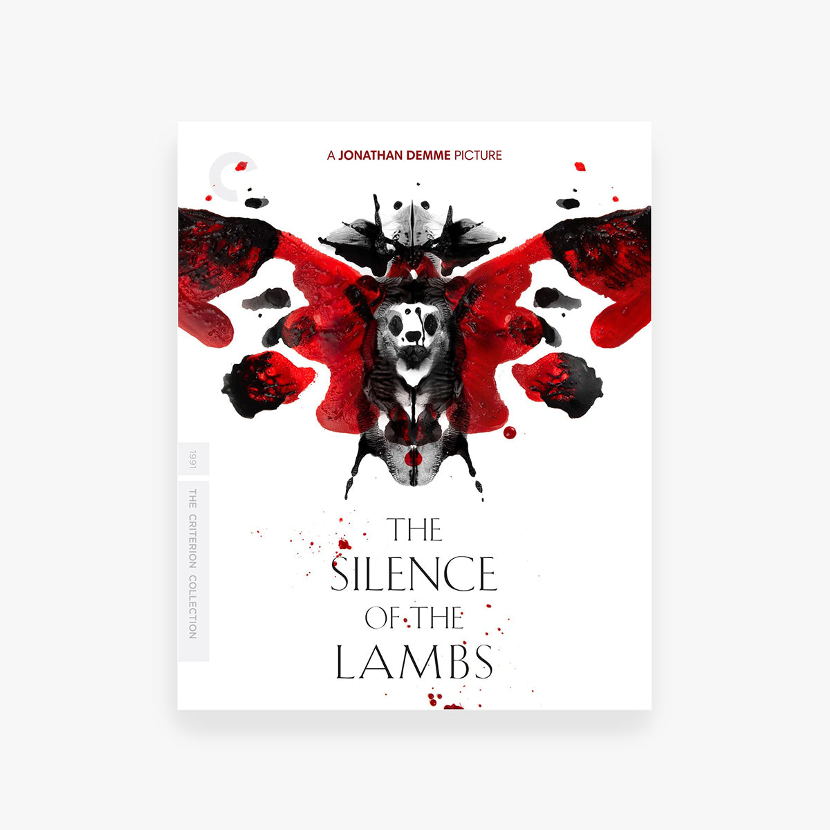 Movie cover for 'The Silence of the Lambs' with a stylized wolf and red splashes on a white background.