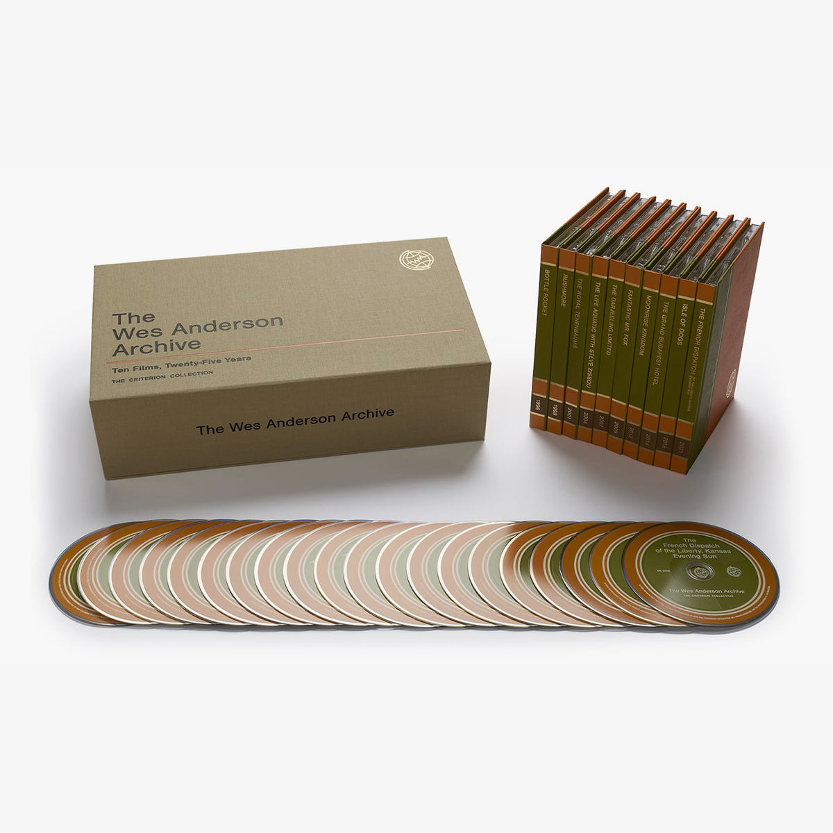 Collection of 'The Wes Anderson Archive' books and discs on a white background