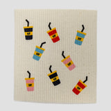 A square cream-colored textured fabric napkin featuring a playful pattern of colorful iced coffee cups with the word 'TIFF' printed on them, set against a plain light gray background.