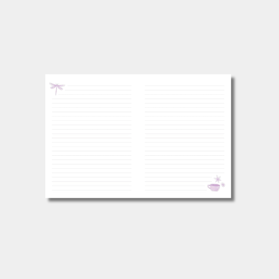 An open notebook shows lined white pages decorated with a small purple dragonfly in the top-left corner and a teacup in the bottom-right.