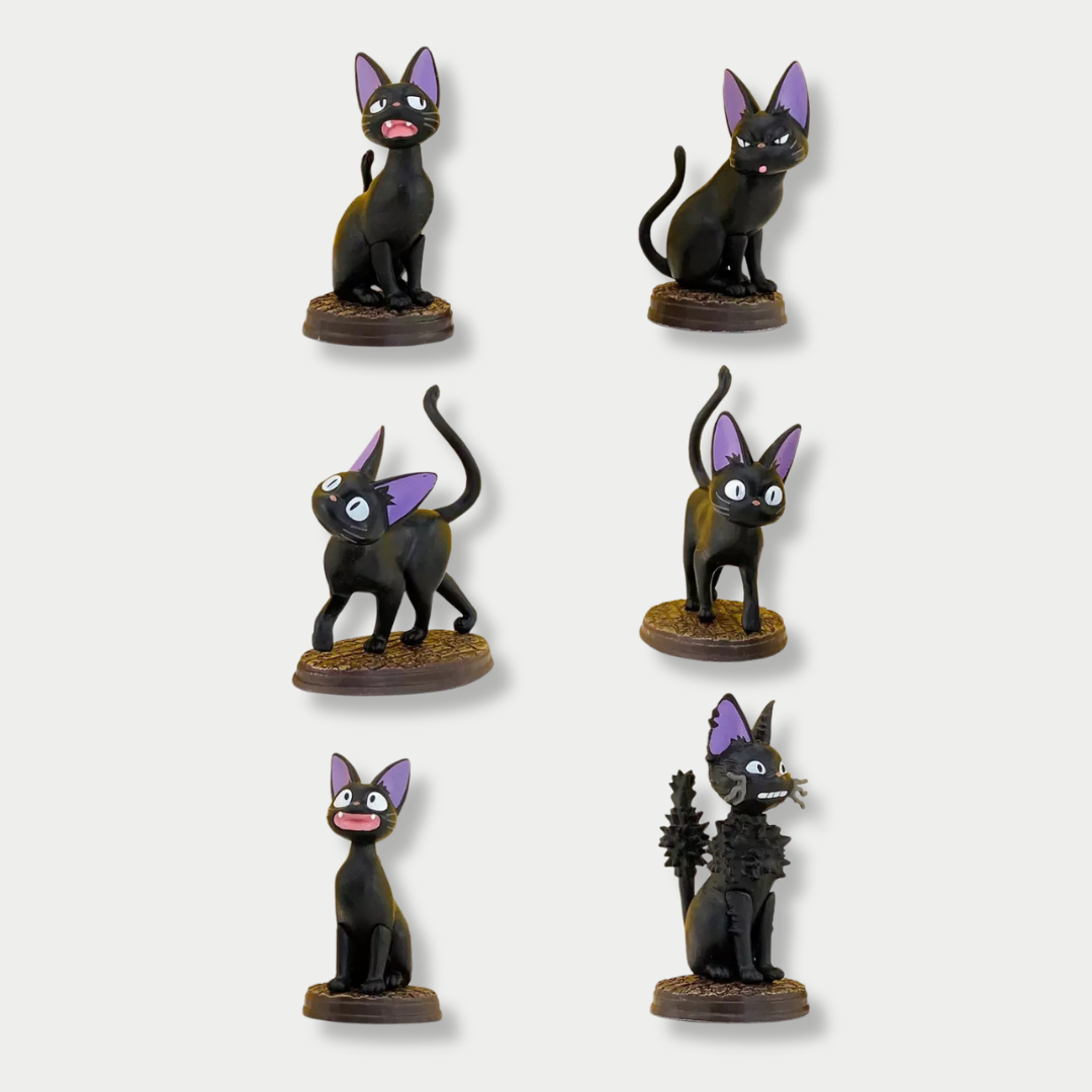 A collection of six miniature figurines displaying the black cat Jiji from Kiki's Delivery Service in various playful poses, each standing on a small brown base against a light gray background.