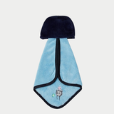 Back of blue hanging hand towel features the face of No-Face from Spirited Away at the top and an embroidered soot sprite near the bottom corner.
