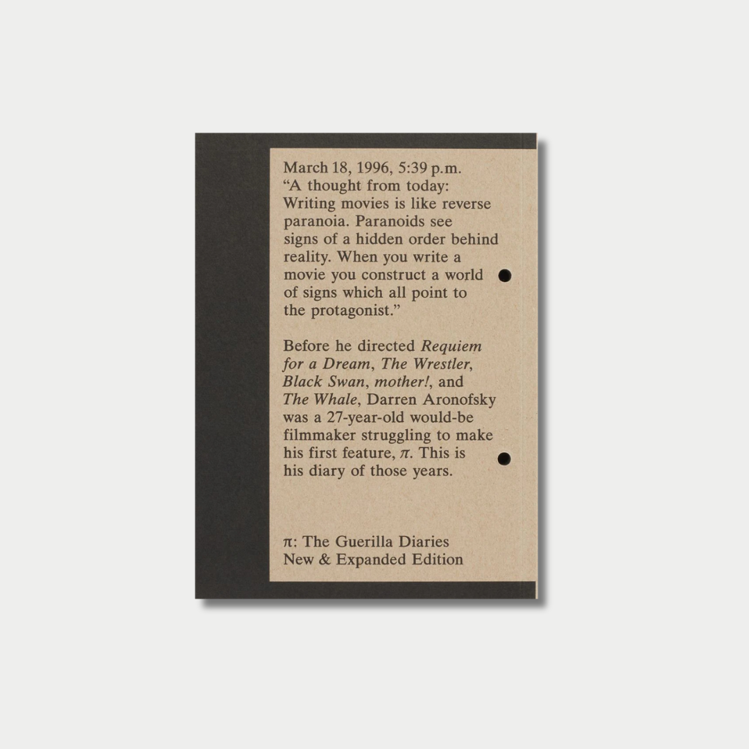 The back cover of Darren Aronofsky's "PI: The Guerilla Diaries" features a block of reflective text about filmmaking on a kraft paper background with a thick black spine strip, all centered against a light gray studio backdrop.