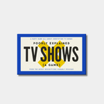 A blue and white box for the party game "Poorly Explained TV Shows," featuring bold black text over a large yellow "X" against a plain light gray background.