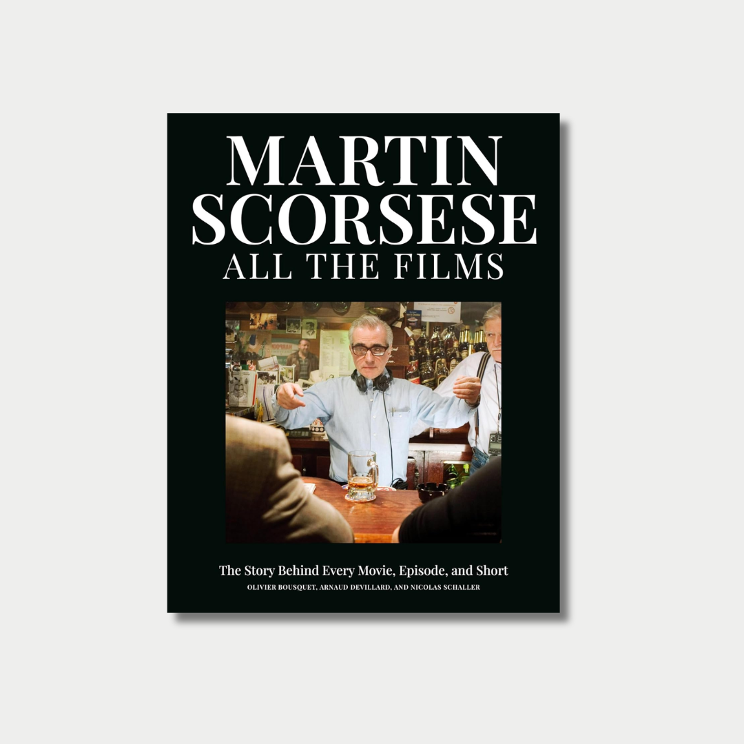 Book cover for "Martin Scorsese: All the Films," featuring a photograph of director Martin Scorsese on a movie set behind a bar, framed by bold white text on a black background.