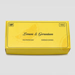A yellow rectangular box of TIFF Lemon & Geranium cold process soap, 100g, shown on a light gray background.