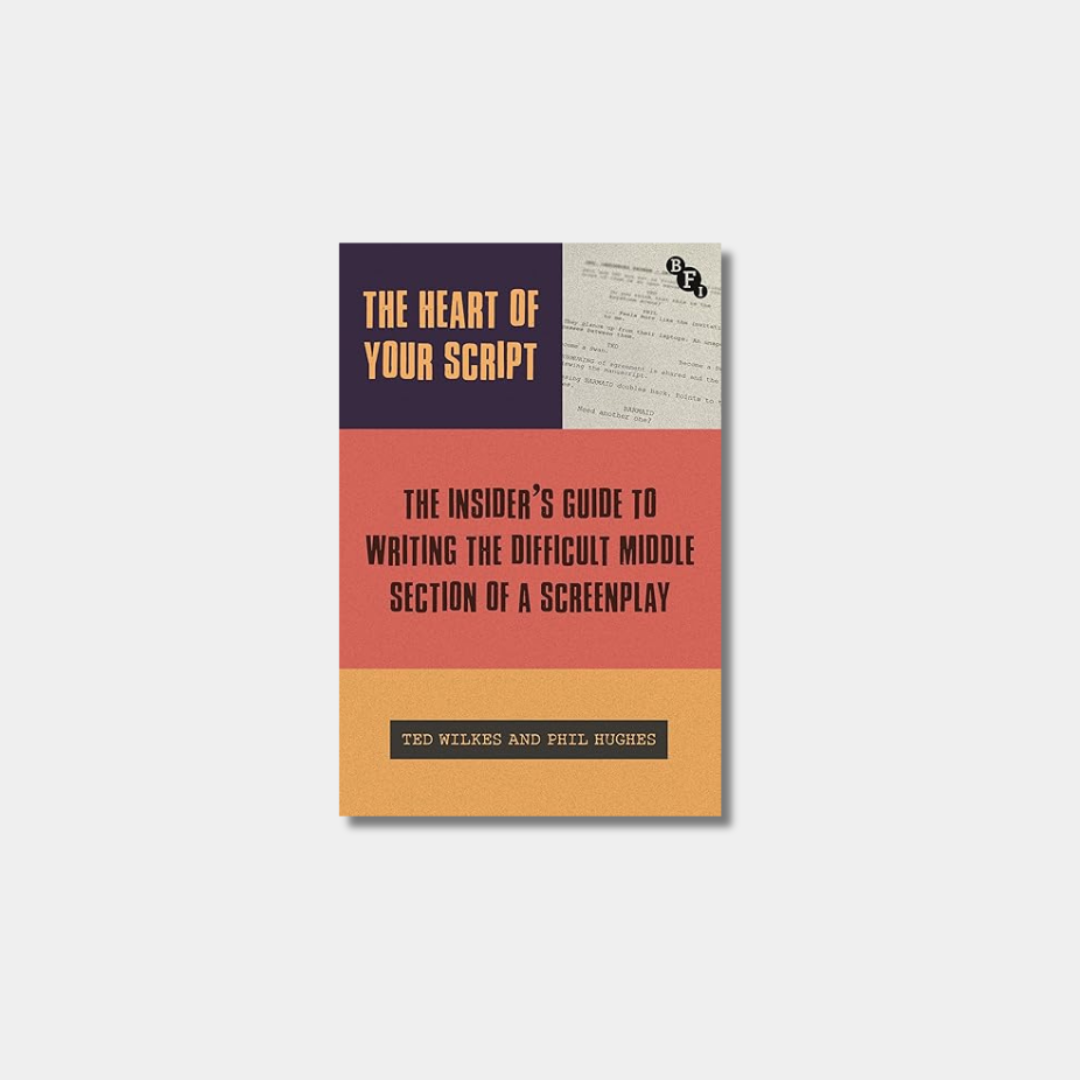 A book cover for "The Heart of Your Script: The Insider's Guide to Writing the Difficult Middle Section of a Screenplay" featuring a three-tiered color-block design in navy blue, red, and orange, with a faded typewriter-style document in the top right corner.