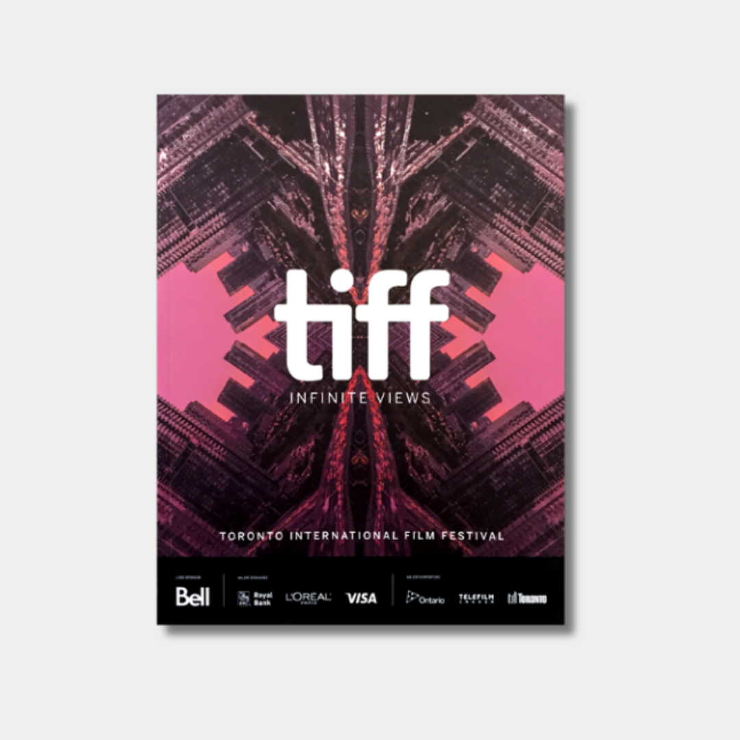 A pink and black poster for the Toronto International Film Festival featuring the text "tiff INFINITE VIEWS" in the center. The background consists of a symmetrical, kaleidoscopic pattern of dark architectural structures against a bright pink sky.