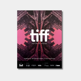 A pink and black poster for the Toronto International Film Festival featuring the text "tiff INFINITE VIEWS" in the center. The background consists of a symmetrical, kaleidoscopic pattern of dark architectural structures against a bright pink sky.