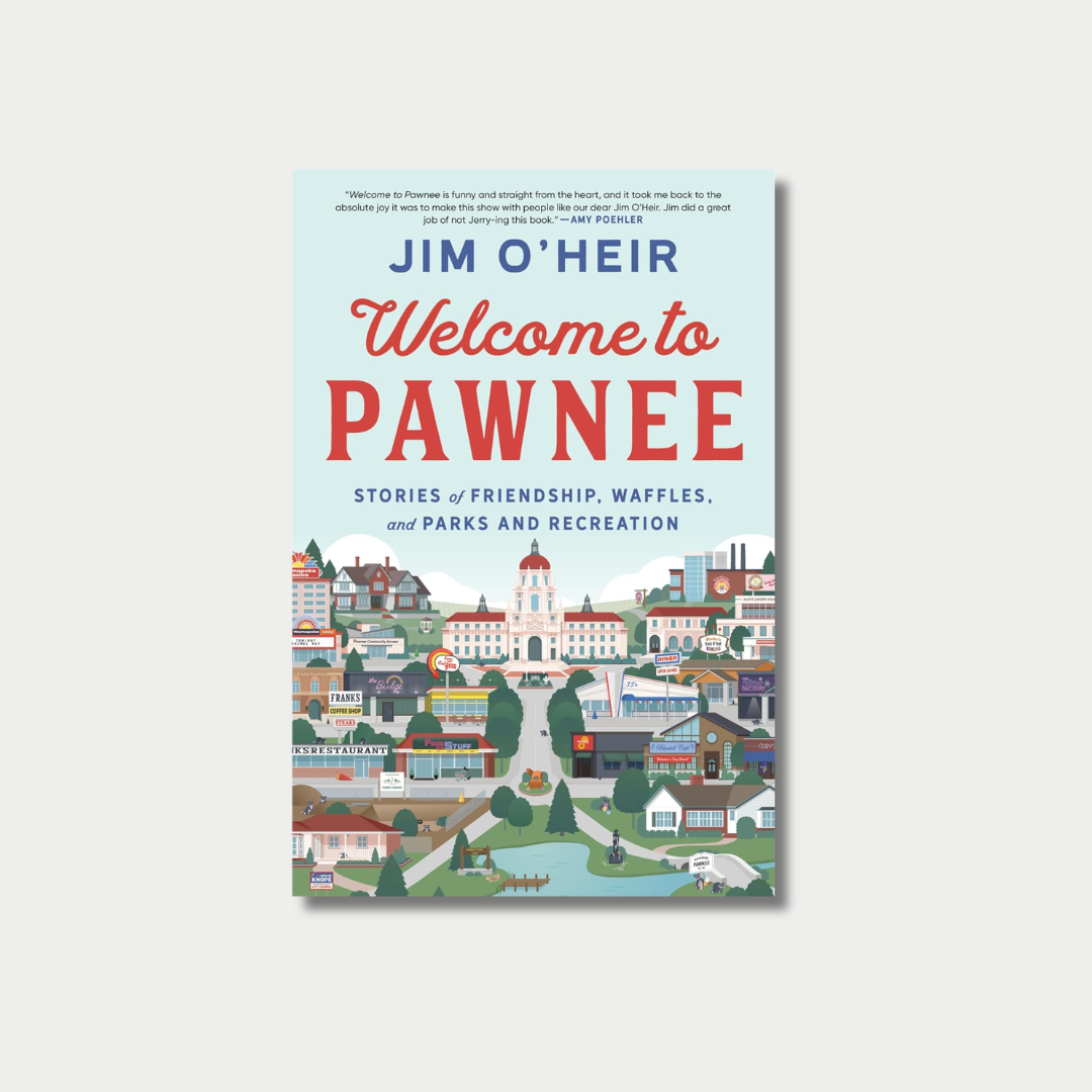 The image shows the book cover of 'Welcome to Pawnee: Stories of Friendship, Waffles, and Parks and Recreation' by Jim O'Heir, featuring a detailed, colorful vector illustration of the fictional town of Pawnee, Indiana, below the text and a quote by Amy Poehler.