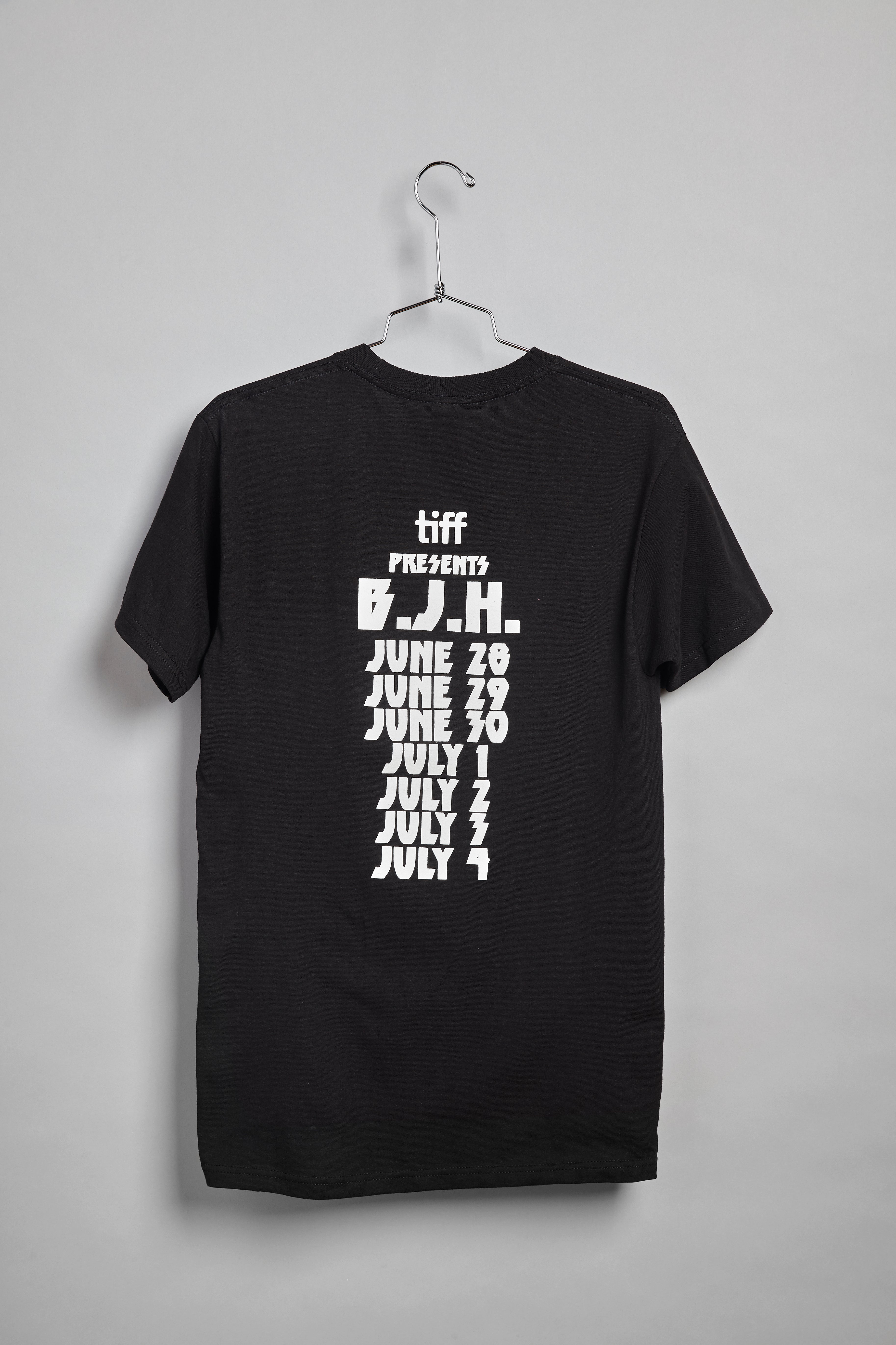 Black T-Shirt with a white "Heavy Metal" style type face on the back. Mimicking dates that are usually written on the back of a concert tour T-Shirt. It reads, "tiff presents B.J.H. June 20, June 29, June 30, July 1, July 2, July 4"